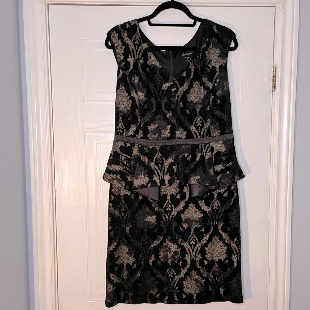 Black and Gold Peplum style dress